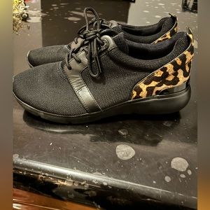 Excellent condition Michael Kors size 7 black and leopard sneaker